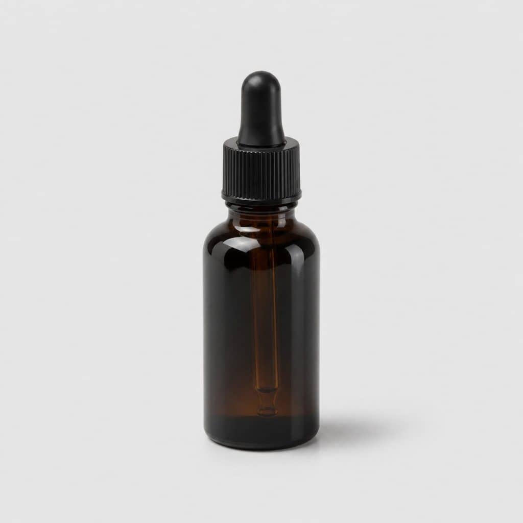 Flacon d'huile essentielle de menthe poivrée avec compte-gouttes