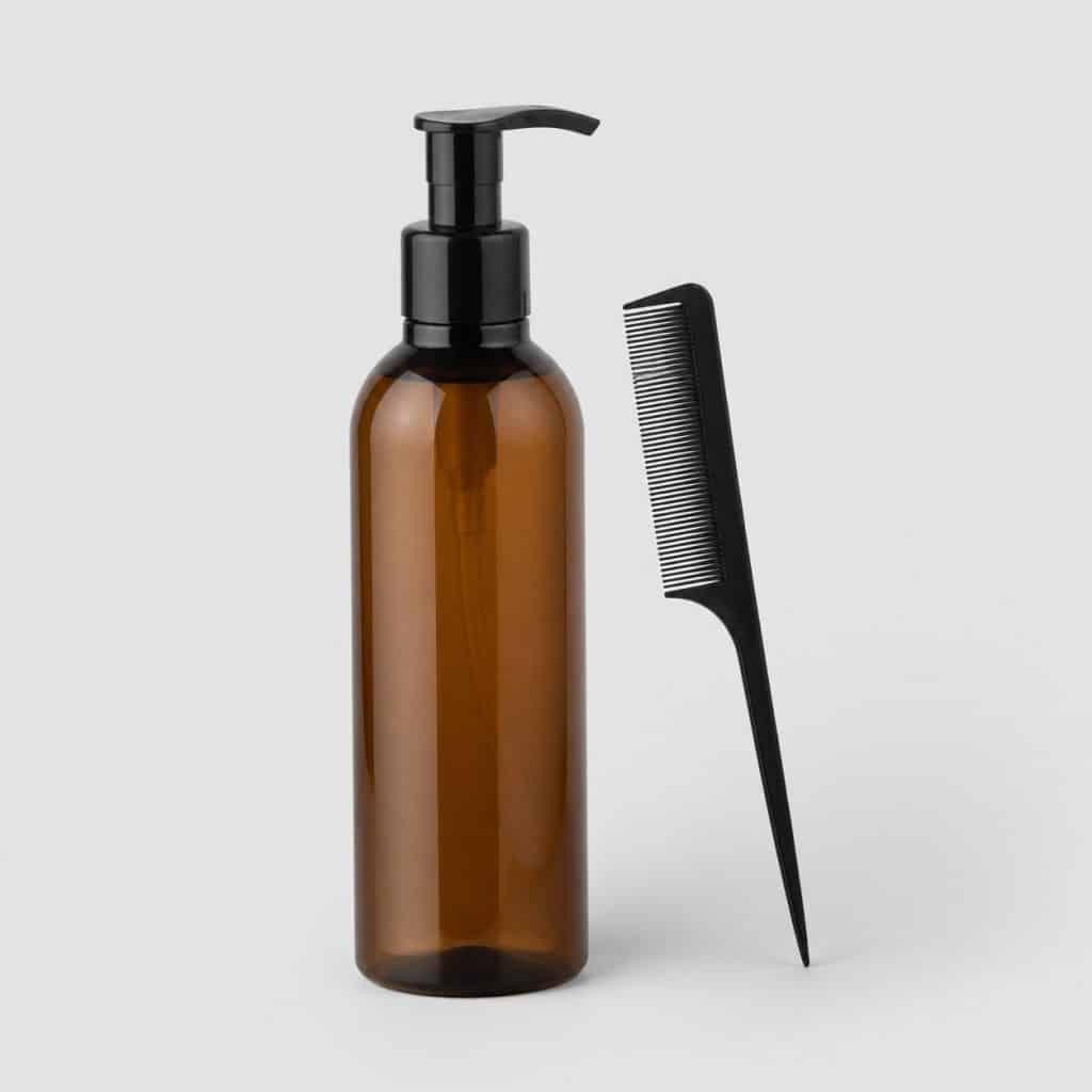 Flacon de lotion anti-poux avec peigne fin inclus