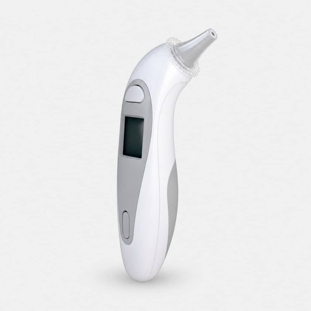 Thermomètre auriculaire à embouts jetables sur fond neutre